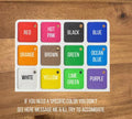 May include: A white rectangular grid containing twelve square colour swatches, each with a small hole in the top right corner. The colours are labelled: red, hot pink, black, blue, orange, brown, green, ocean blue, white, yellow, lime green, and purple.